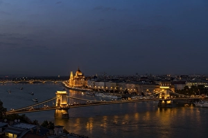 City view, Danube river with chain bridge and parliament at dusk
