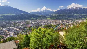 City view with the Inn river in front of Patscherkofel 2246m and Serles 2717m