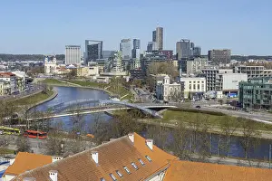 City view with modern buildings and river under clear weather
