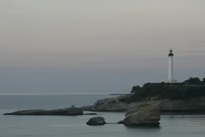 City waterfront with marina, lighthouse