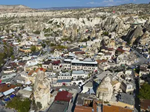 Cityscape in Cappadocia with numerous buildings and characteristic rock formations