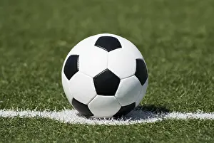 Classic black-and-white football lying on the kick-off point