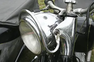 Classic car headlight of a motorbike with sidecar