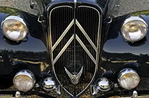 Classic car, headlights and radiator grille of a Citroen 11 CV Commercial