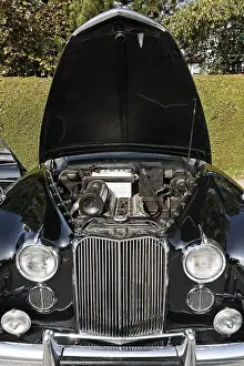 Classic car Jaguar Mark VIII, with open hood