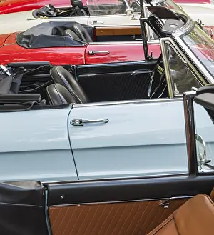 Several Classic cars Alpha Romeo convertibles on a parking