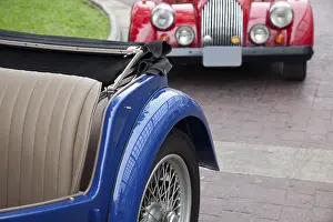 Two Classic Cars On The Road