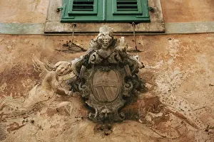 Classic outdoor bas-relief. Ancient statue on the walls of the old town of Kotor
