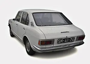 Classic white Toyota Corolla parked on white background