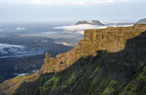 Cliff in the evening light, Impressive landscape with mountains and glaciers