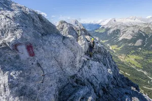 Climbers on the via ferrata on the ridge of Hohe Munde