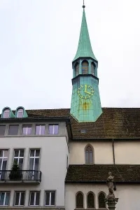 Clock and Church Tower and House in Zurich