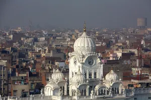 Clock Tower and city of situated in Harmandir Sahib or Golden Temple in Amritsar
