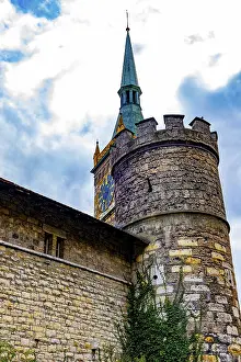 Clock Tower and Fortification Tower and Wall with Blue Sky and Clouds in a Sunny Autumn Day in City of Biel
