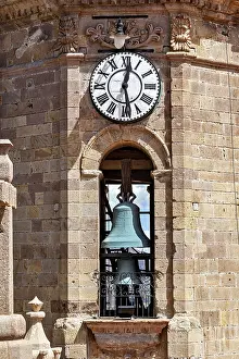 Category Cities DE Prints: Detail of a clock tower with a large clock and a visible bell in a colonial building