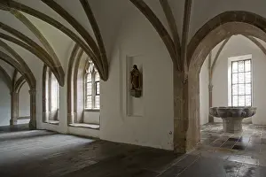 Cloister, west wing with view into the well house
