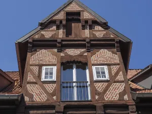 Close-up of a historic half-timbered house with striking wooden structure