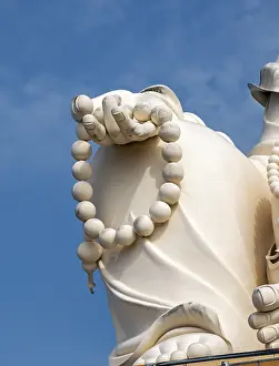 Close-up of the statue of Budai - Laughing Buddha