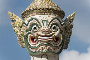 Close up, statue of giant Yaksha demon guarding gates of Grand Palace