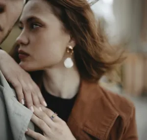 Close-up of a woman with the wind blowing her hair