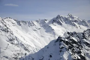 Cloud gathers around the alpine peaks of the Southern Alps
