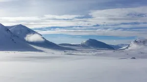 Category Scandinavia Prints: Cloud between mountains in the snow