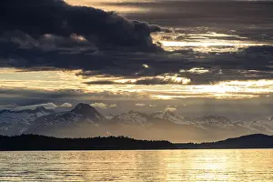 Cloudy mood with sun over the sea