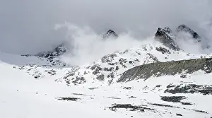 Cloudy mountains with snow, peak Noerdliche Wildgratspitze and Suedliche Wildgratspitze