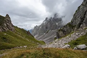 Cloudy mountains, view into a mountain valley