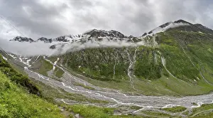 Cloudy valley of Schlegeisgrund with mountain stream