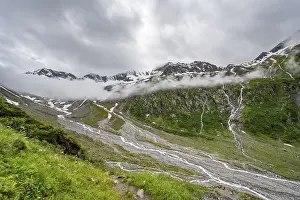 Cloudy valley of the Schlegeisgrund with mountain stream