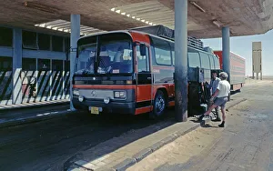 Coach at a petrol station, Libyan Desert