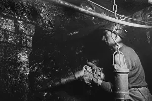 Coal miner, hewer working underground in shaft