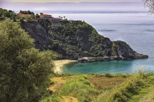 Coastal landscape with steep cliffs and blue sea