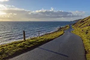 Coastal road in typical scottish landscape