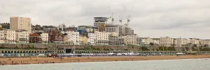 A coastal scene with a long stretch of beach