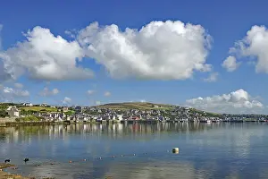 Coastal town with reflecting water