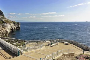 Coastal view with a cobbled viewpoint over the wide sea
