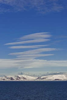 Coastline, cirrus fibratus clouds