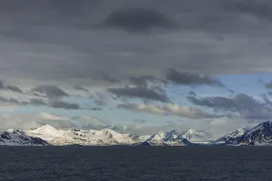 Coastline, snowy mountains, Northwest Coast