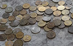 Coins in the flour in the balance