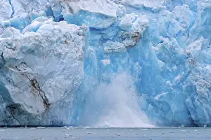 Collapsing ice wall of Fjortende Julibreen
