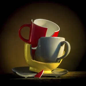 A collection of broken tableware is displayed
