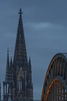 Cologne Cathedral and the Hohenzollern Bridge illuminated with LED lights