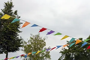 Colored festive flags hung on the street