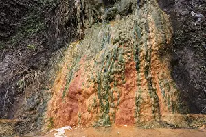 Colored mineral deposits in a thermal spring in Cilaos Cirque de Cilaos