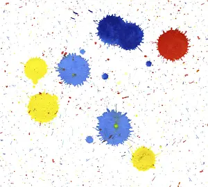 Colored paint splatters in white back
