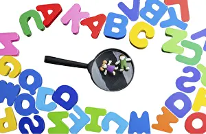 Colored wooden letters of the English alphabet on a white background