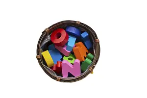 Colored wooden letters of the English alphabet on a white background