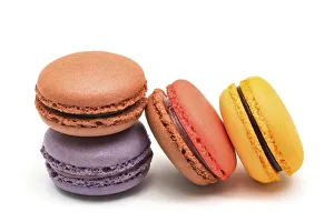 Colorful fresh macarons isolated on white background